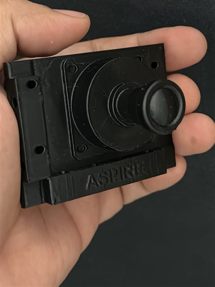 Finished 3D-printed ASPIRE camera housing held in hand